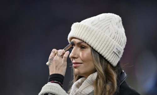 TV presenter Laura Wontorra DAZN, portrait, cap, powdered forehead, make-up, Allianz Arena, Munich,