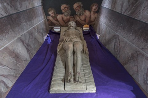 Figure of Christ in the Holy Sepulchre, behind a motif of three men in purgatory, St Bartholomew's