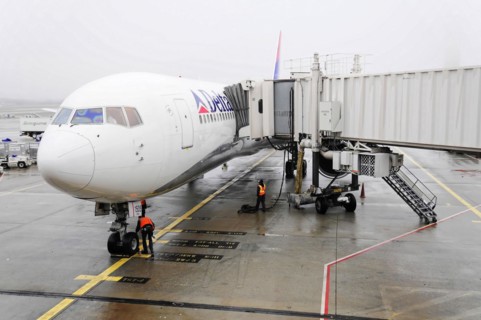 AUGUSTO C. SANDINO Airport, Managua, Nicaragua, An aircraft at the gate with jet bridge extended