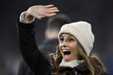 TV presenter Laura Wontorra DAZN, portrait, cap, laughs, waves to her fans, Allianz Arena, Munich,
