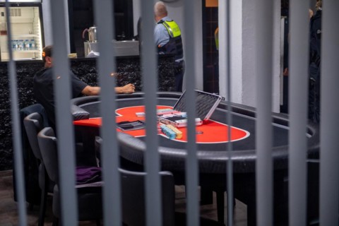 Interior view of a casino with a view of a poker table and the surveillance personnel, The Cologne