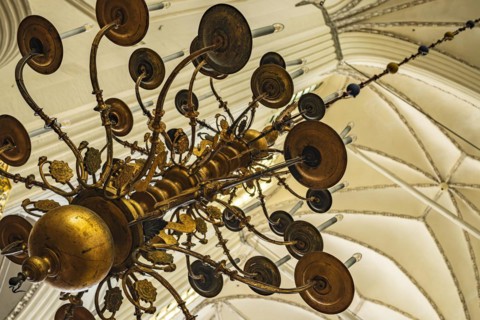 Chandelier hanging from the vault, interior view of St Mary's Church in the historic old town of