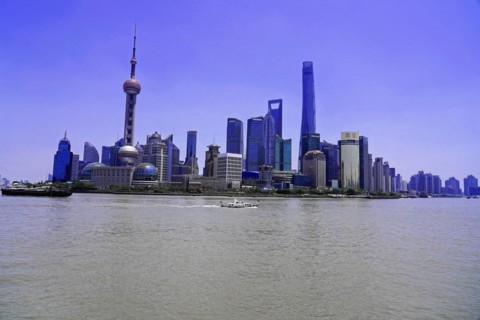View from the Bund to the skyline at the Huangpu River with Oriental Pearl Tower, World Financial