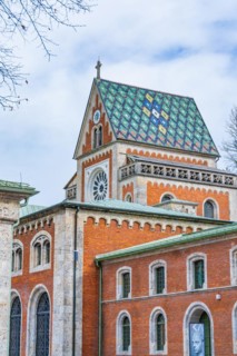 Historic building with strikingly patterned tiled roof and tower, Alte saltworks, Bad Reichenhall,