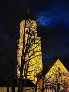 St Martin's Church in Illertissen by night and moonlight. Illertissen, Swabia, Bavaria, Germany,