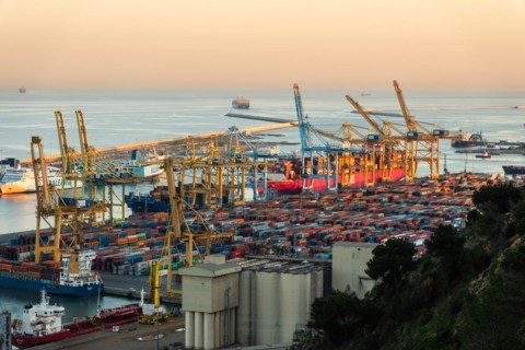 Container harbour in evening light in Barcelona, Spain, Europe