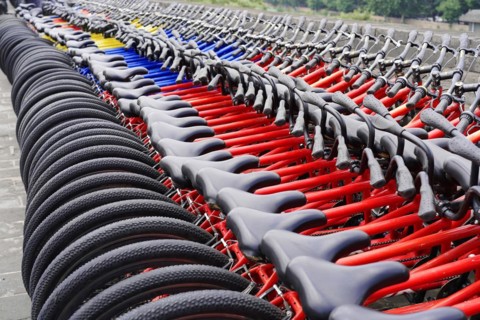 Rental bicycles, Xian, Shaanxi, China, Asia, Orderly rows of bicycles with red frames in a public