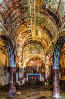 Centre apse with altar and Trinity as throne of grace, Gothic frescoes from 1490, a highlight of