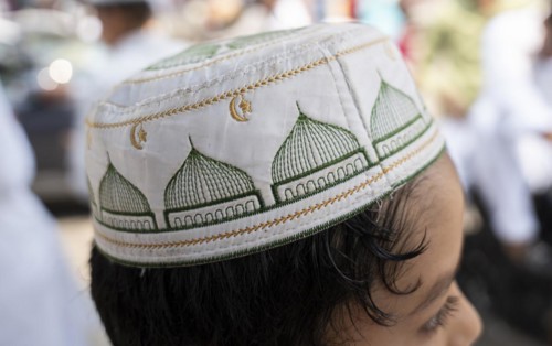GUWAHATI, INDIA, APRIL 11: Muslims gather to perform Eid al-Fitr prayer at Eidgah in Guwahati,