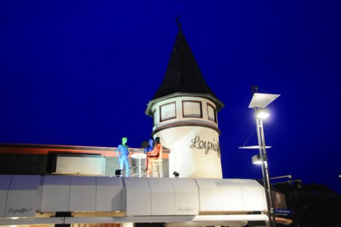 Evening, Westerland, Sylt, Schleswig-Holstein, A tower with figures on the balcony illuminated