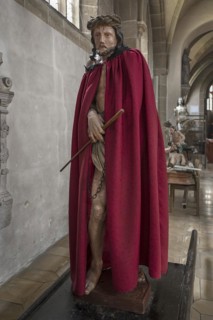 Life-size, carved figure of Jesus with a red cloak, 350-year-old processional figure in St