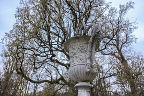 Cast zinc vase on a pedestal in the castle park, Ludwigslust, Mecklenburg-Vorpommern, Germany,