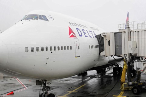 AUGUSTO C. SANDINO Airport, Managua, Nicaragua, A Delta aircraft at the gate connected to a