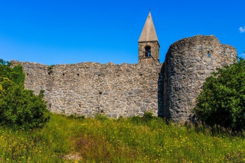 Romanesque Church of the Holy Trinity, 15th century, behind fortified walls, Hrastovlje, Slovenia,