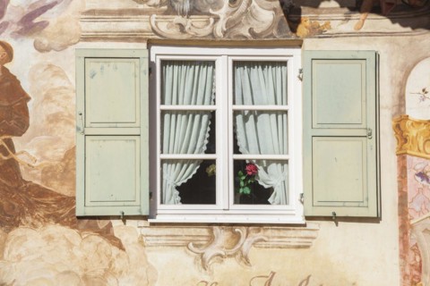 Lueftlmalerei on old house facade with wooden window, Jocherhaus, district Garmisch,