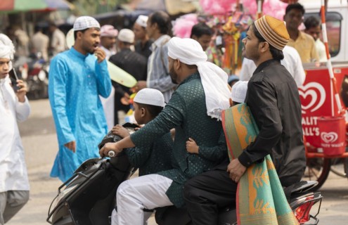 GUWAHATI, INDIA, APRIL 11: Muslim people with children walk towards an Eidgah to perform Eid