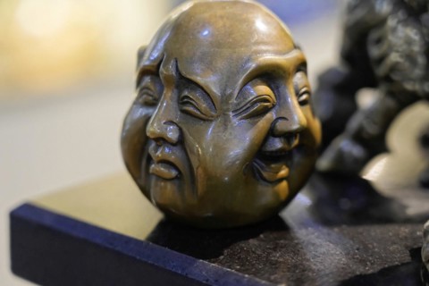 Xian, Shaanxi Province, China, Asia, A detailed bronze sculpture with two different faces and
