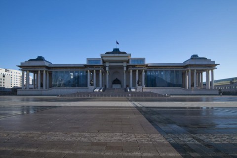 Mongolian government palace, state palace, parliament building with statue of Genghis Khan in the