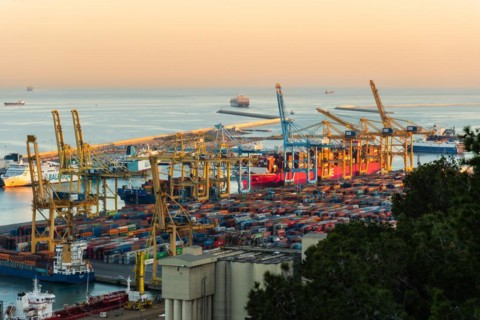 Container harbour in evening light in Barcelona, Spain, Europe