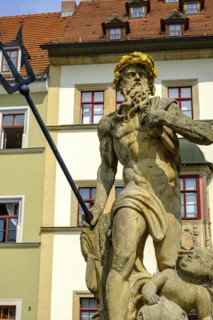 The Neptune Fountain in front of the Hofapotheke, market square in Weimar, Thuringia, Germany,