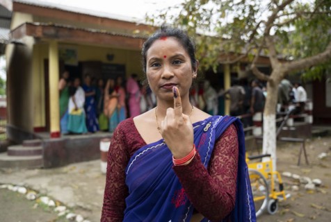 BOKAKHAT, INDIA, APRIL 19: A women show her marked finger after casting vote during the first phase