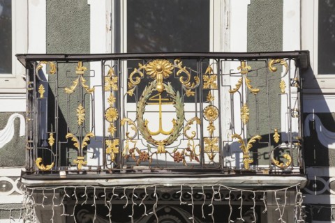 Old, decorated balcony at the old pharmacy on Marienplatz, district of Garmisch,