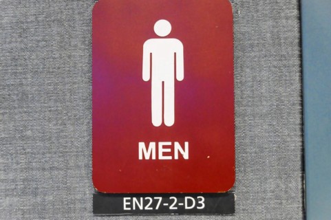 AUGUSTO C. SANDINO Airport, Managua, Nicaragua, Red sign for the men's toilet with symbol and