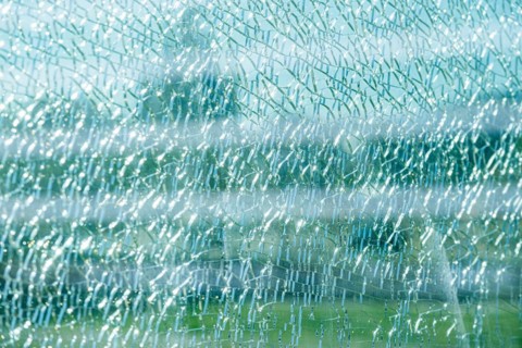 Cracked glass of a laminated glass pane