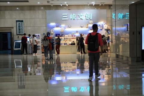 Chongqing, Chongqing Province, China, Asia, People in a shopping area with shiny floors and