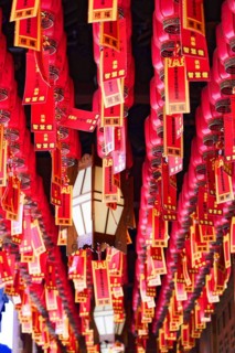 Jade Buddha Temple, Shanghai, ceiling full of red Chinese lanterns in traditional arrangement,