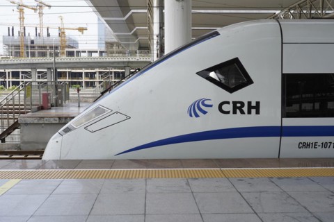 Express train CRH380 to Yichang, A high-speed train stands quietly at a railway station during the