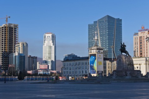 Building boom in Ulan Bator, post office, statue of Damdin Suekhbaatar on Sukhbaatar Square,