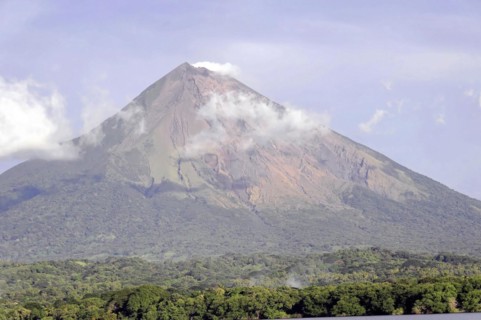 Lake Nicaragua, in the background the island of Ometepe, detailed view of an active volcano with