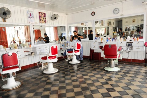 Granada, Nicaragua, Interior view of a traditional hairdressing salon with red and white barber