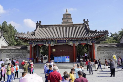 Chongqing, Chongqing Province, China, Asia, Entrance gate to a Chinese temple with people and