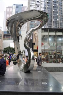 Stroll in Chongqing, Chongqing Province, China, Asia, A spiral-shaped reflective sculpture stands