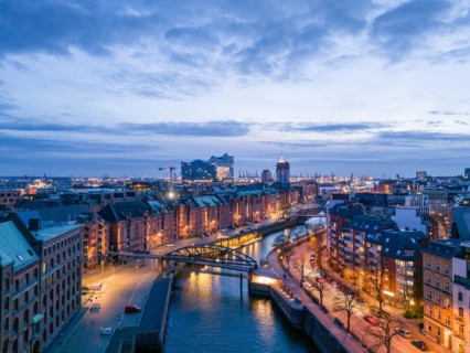 Aerial view of Speicherstadt Hamburg and the Elbe Philharmonic Hall with customs canal at blue