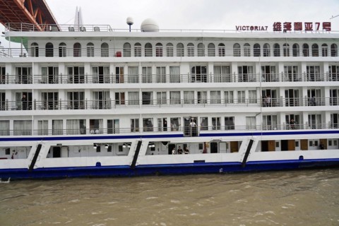 Chongqing, Chongqing Province, China, Close-up of a ship window area with reflective surfaces on