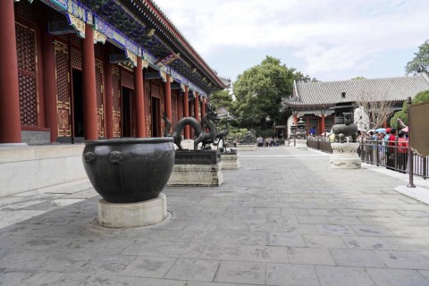 New Summer Palace, Beijing, China, Asia, A large historic cauldron on a stone floor at a historic