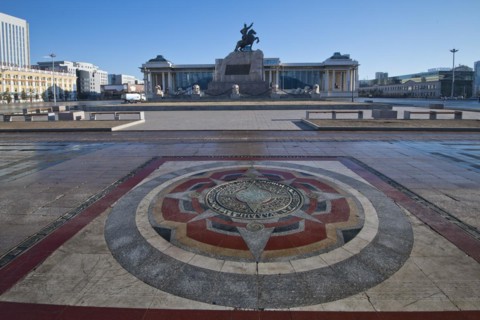 Mongolian government palace, state palace, parliament building with statue of Genghis Khan in the