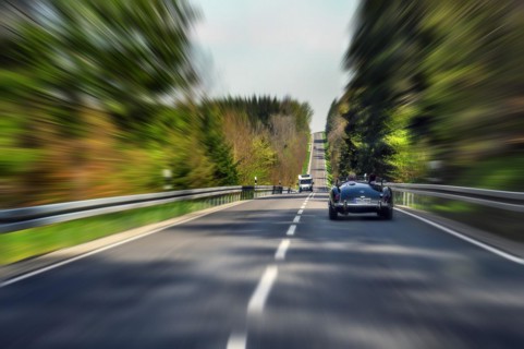 Zoom effect, country road near Boerwang with old MG sports car, Allgaeu, Swabia, Bavaria, Germany,