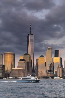 Manhattan skyline with One World Trade Centre at sunset, New York City, New York State, USA, New