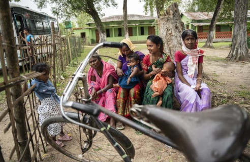 BOKAKHAT, INDIA, APRIL 19: Voters wait at a polling station to cast their votes during the first