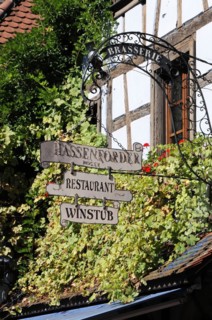 Kaysersberg, Alsace Wine Route, Alsace, Departement Haut-Rhin, France, Europe, Decorated sign of a