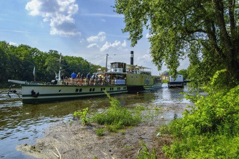 The historic paddle steamer KURORT RATHEN has docked at the steamer landing stage in Pillnitz,