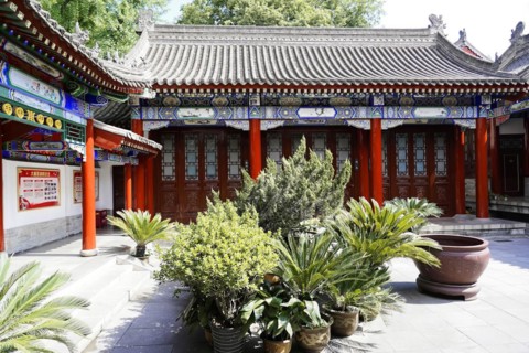 Chongqing, Chongqing Province, China, Asia, Traditional Chinese building complex with plants in the