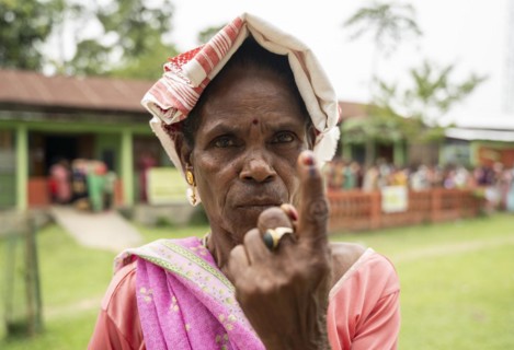BOKAKHAT, INDIA, APRIL 19: A women show her marked finger after casting vote during the first phase