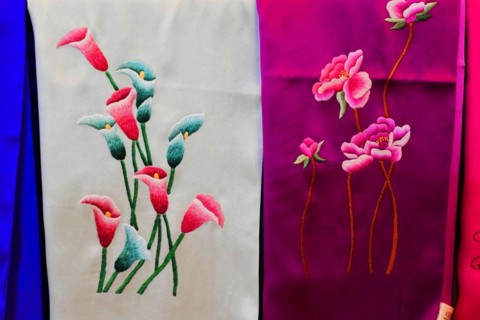 Silk factory Shanghai, close-up of traditionally embroidered flowers on fabric, Shanghai, China,