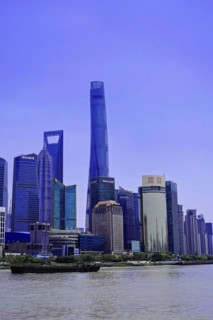 View from the Bund to the skyline at the Huangpu River with Oriental Pearl Tower, World Financial