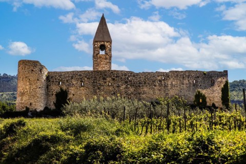 Romanesque Church of the Holy Trinity, 15th century, behind fortified walls, Hrastovlje, Slovenia,